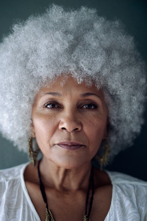 Gray afro textured curly hair for older women