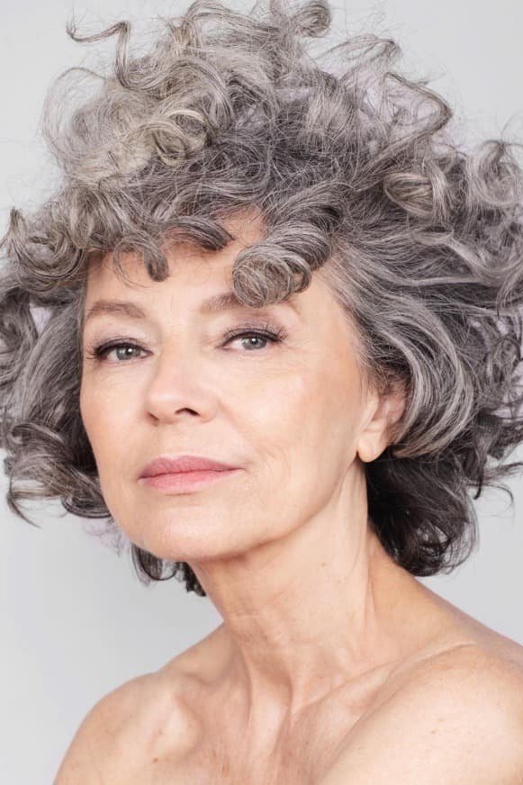 Big Soft Swept Gray Curls - silver curly gray hairstyle for older women, idea 10