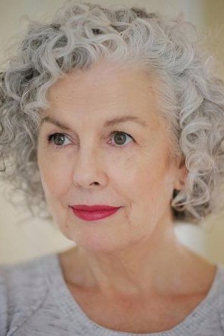 Cropped Tight Silver Curls - silver curly gray hairstyle for older women, idea 13