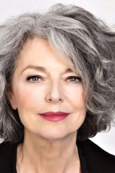 Side-Parted Wavy Silver-Gray Bob - silver curly gray hairstyle for older women, idea 23