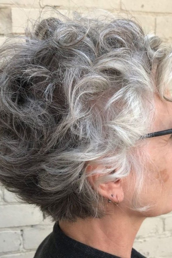 Voluminous Silver Curls with Glasses, Side View - silver curly gray hairstyle for older women, idea 43