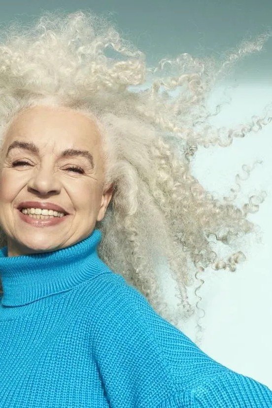 Windblown White Curly Afro - silver curly gray hairstyle for older women, idea 53