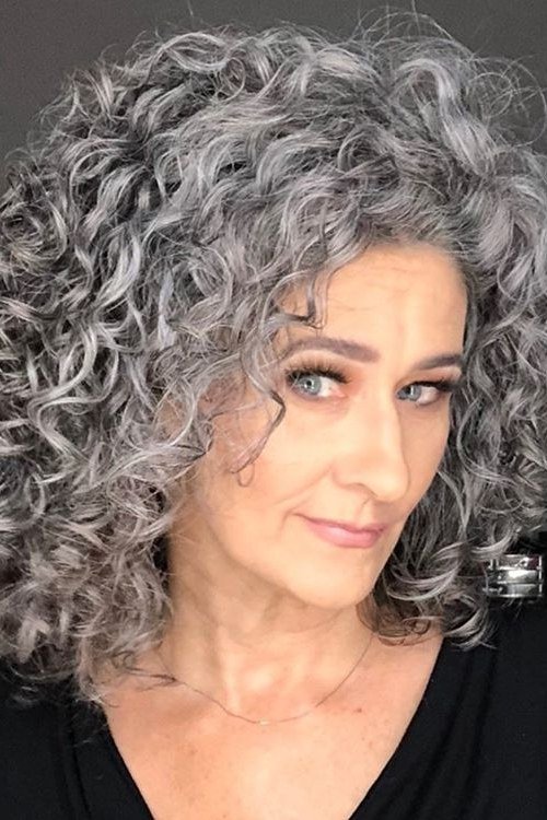 Side-Parted Voluminous Curly Gray Bob - silver curly gray hairstyle for older women, idea 66
