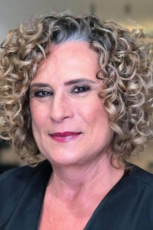 Silver gray curly bob hairstyle for women over 60, front view