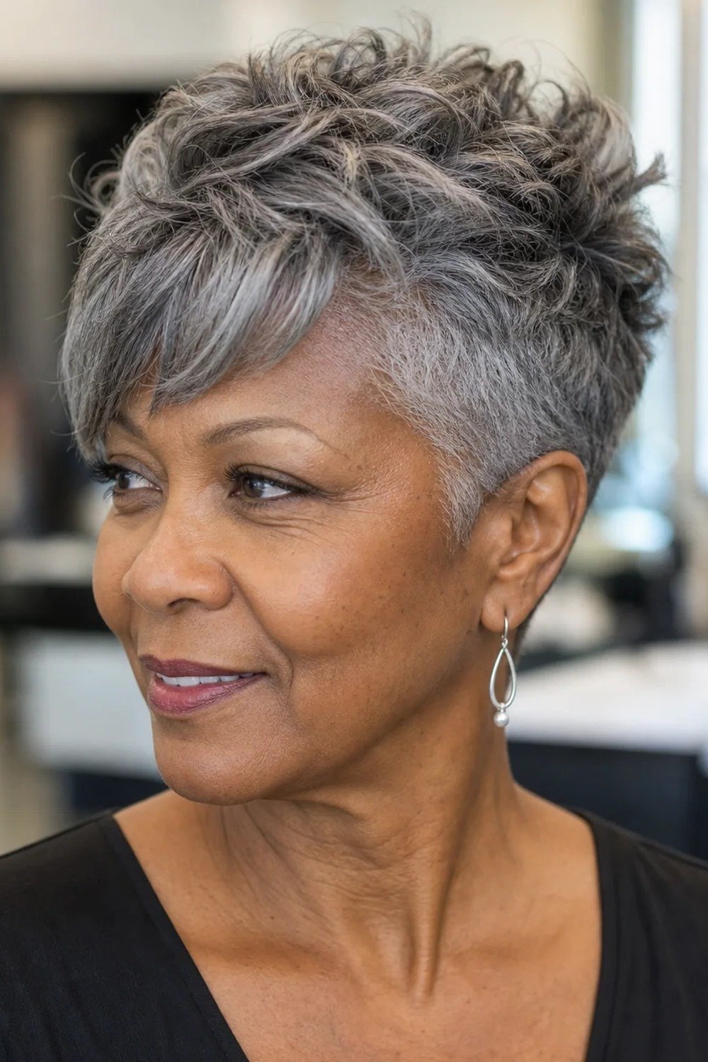 Salt-and-Pepper Pixie with Side Part - curly pixie haircut for women over 60 (idea 32 of 70)