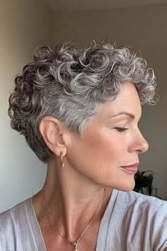 Gray Pixie in White, Side View - curly pixie haircut for women over 60 (idea 60 of 70)