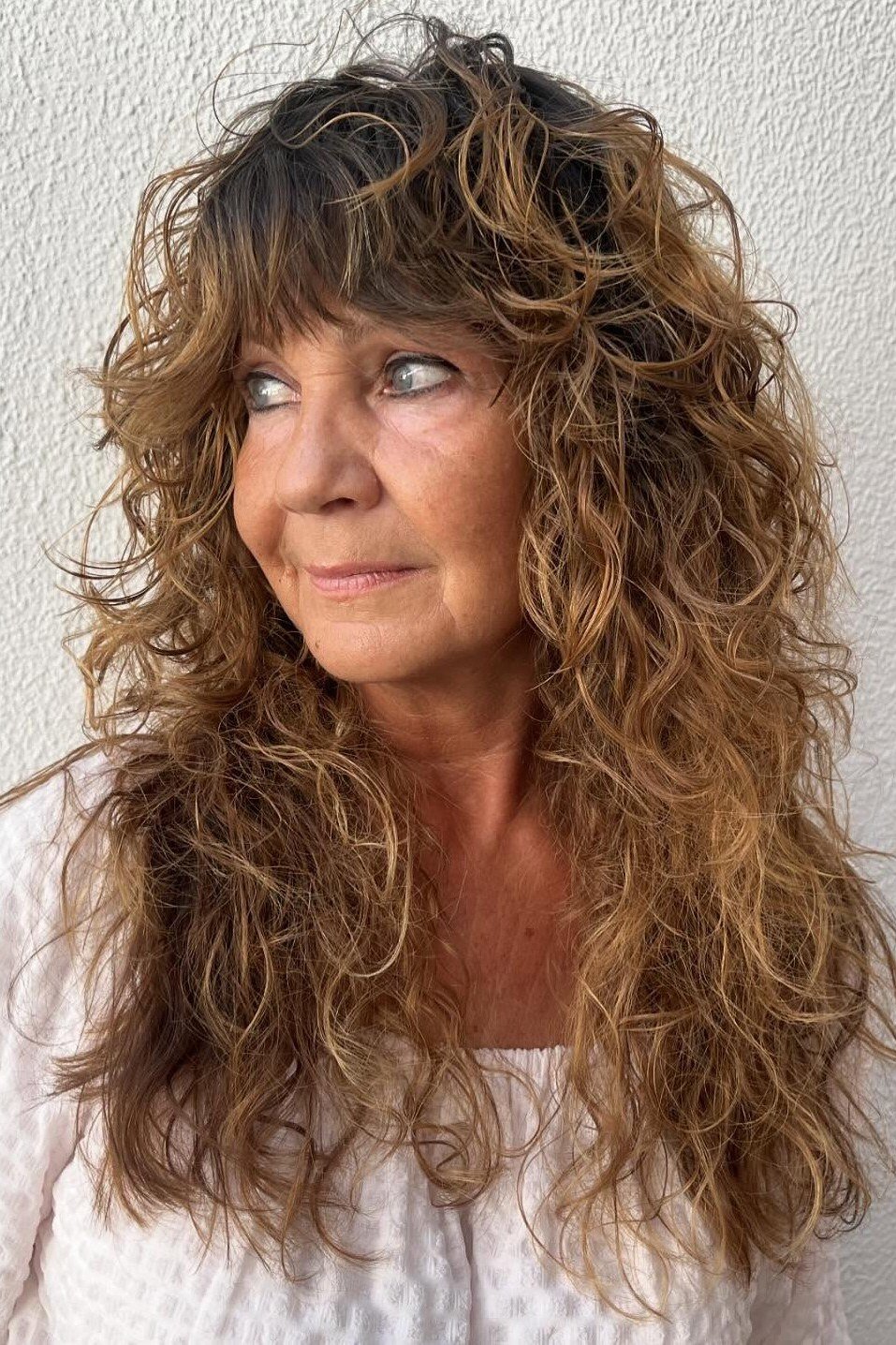 Natural Brown Long Curly Shag for women over 60, three-quarter view