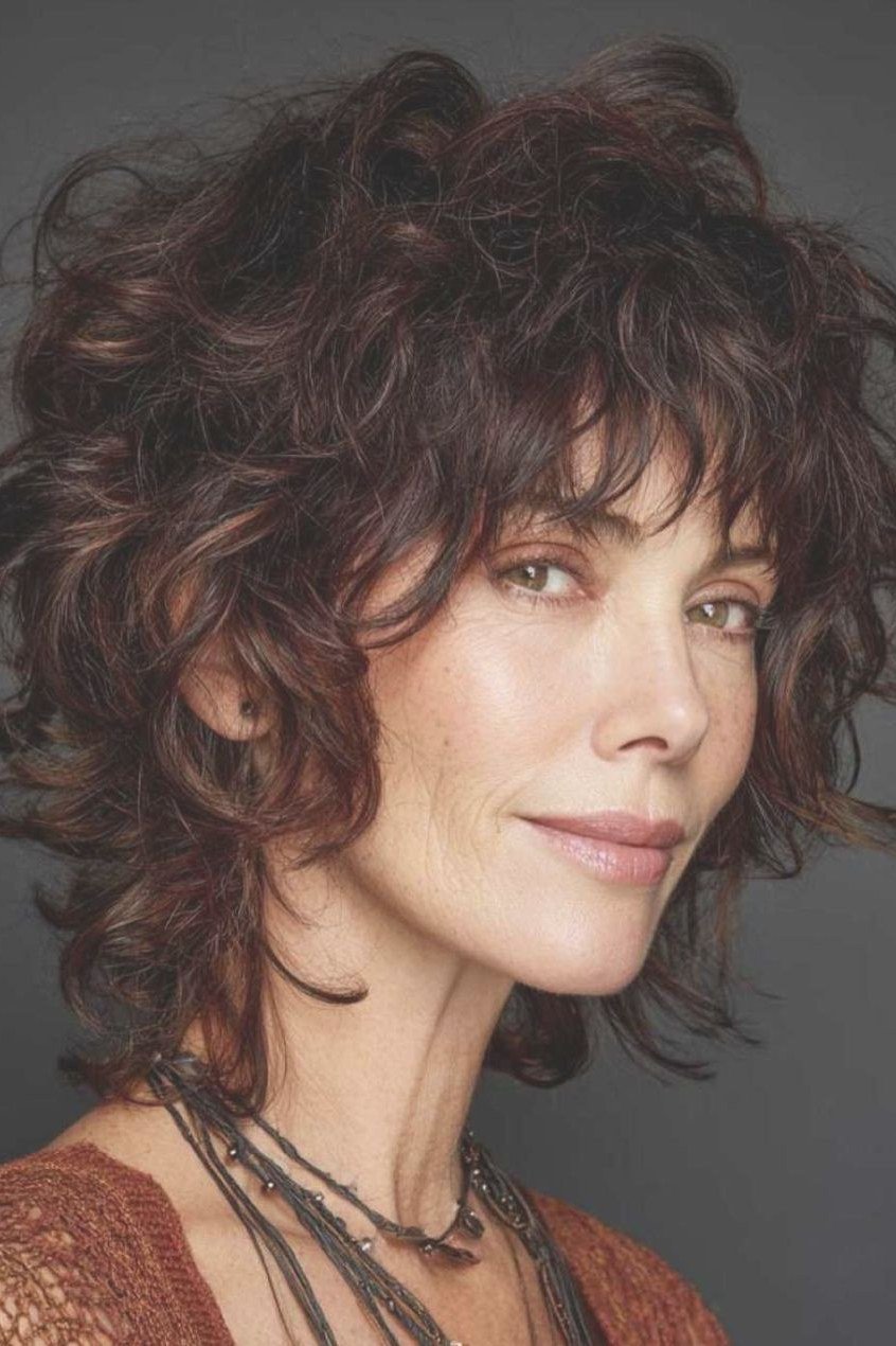 Dark Curly Shag With Curly Bangs for women over 60, three-quarter view