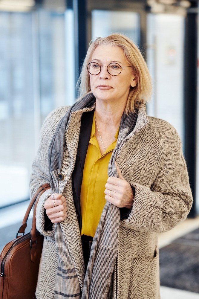 Beige Blazer with Mustard Blouse and Glasses