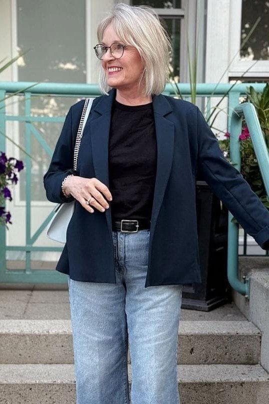 Navy Blazer with Black Top and Jeans on the Steps