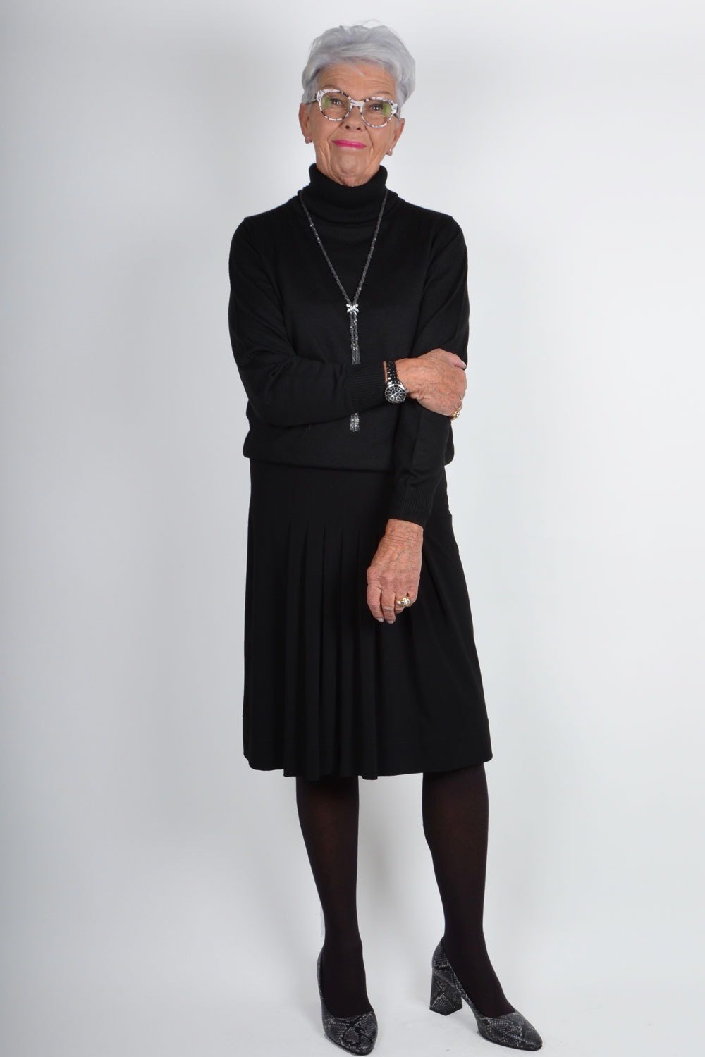 Black Turtleneck with Black Pleated Skirt