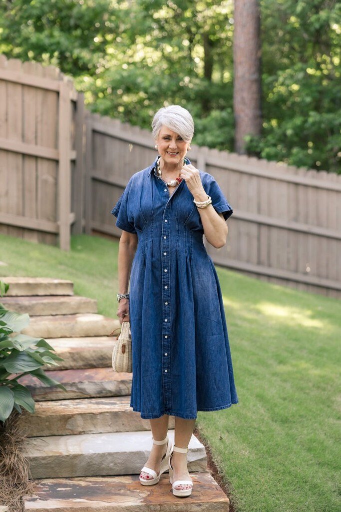 Older woman in denim shirt dress, garden steps - denim dresses for women over 60