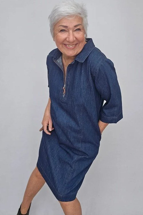 Older Asian woman in dark denim shirt dress, studio - denim dresses for women over 60