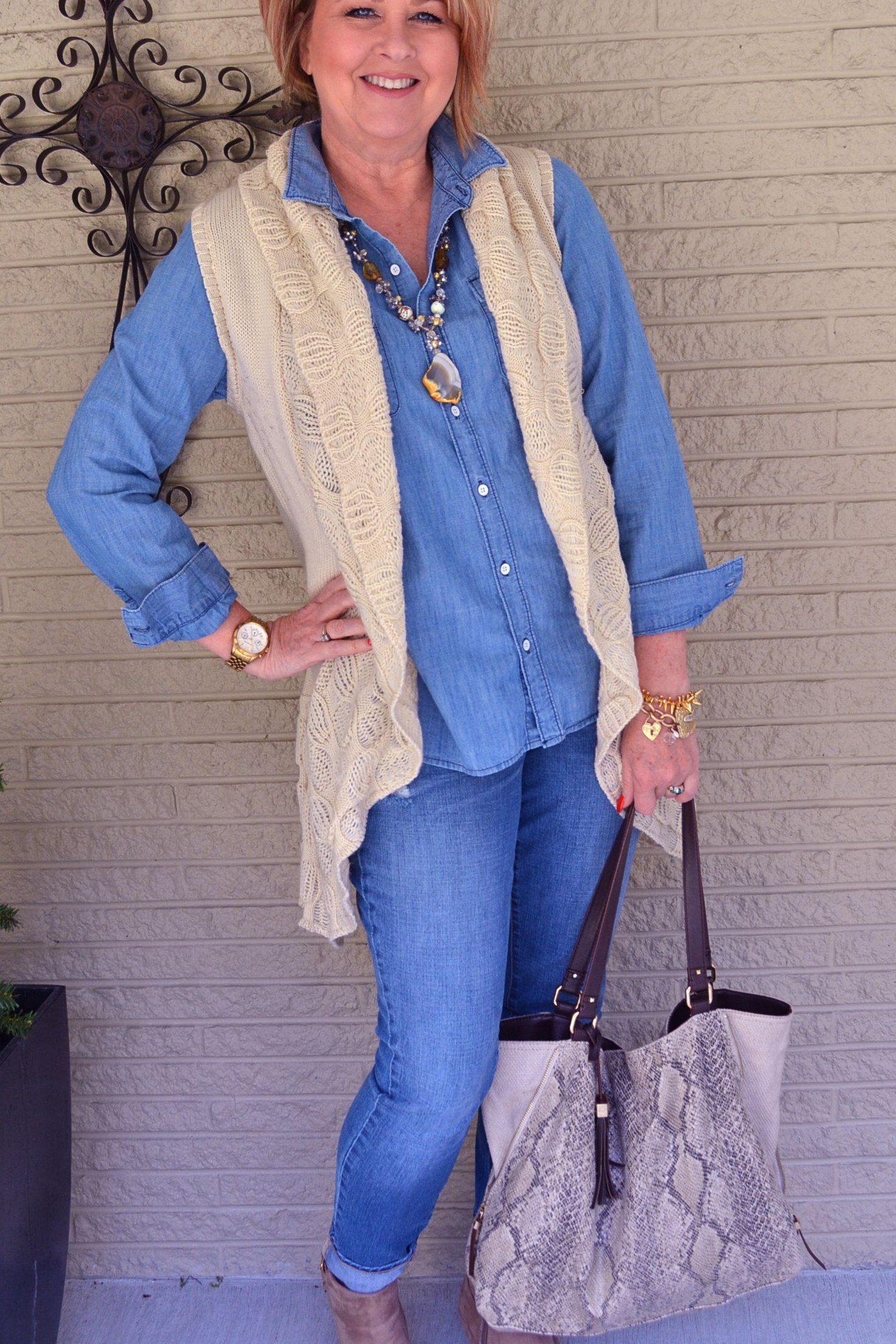 Chambray shirt, knit vest, medium jeans - denim outfit idea for women over 50