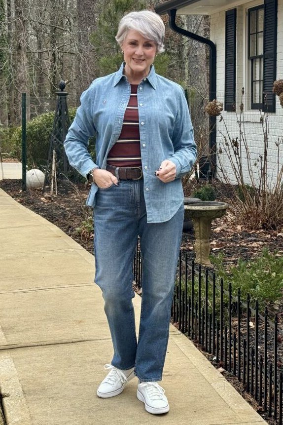 Chambray shirt, striped tee, medium jeans, sidewalk - denim outfit idea for women over 50