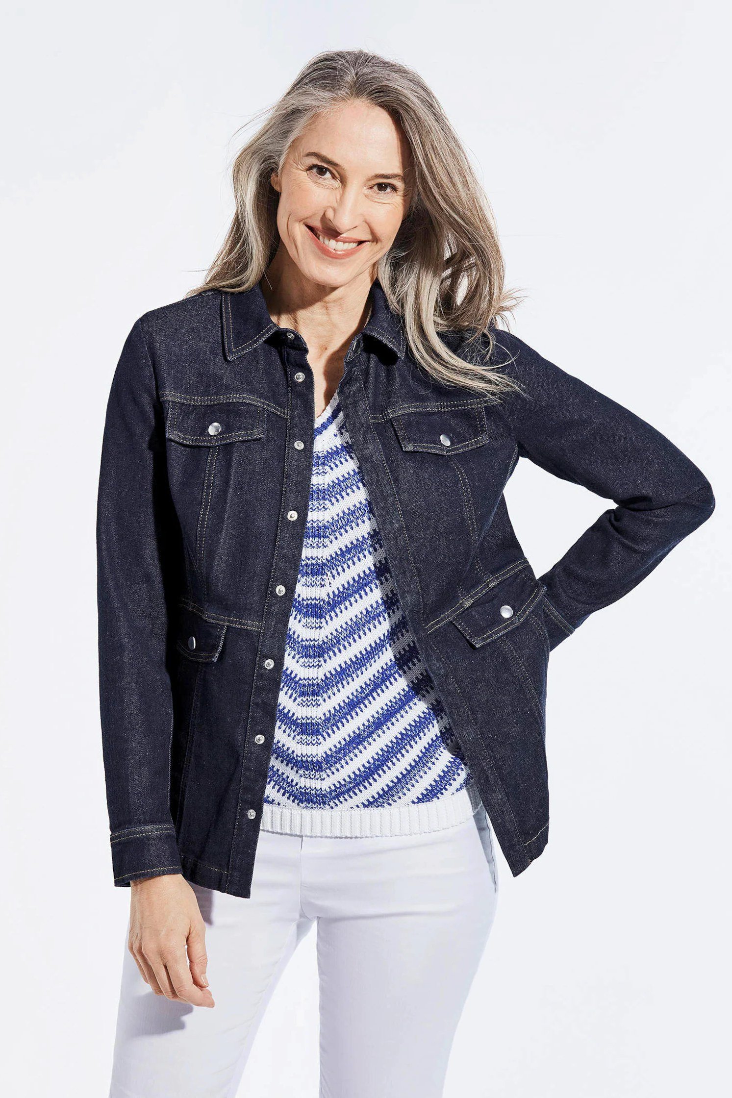 Dark denim jacket, striped sweater, white jeans - denim outfit idea for women over 50