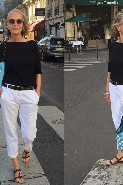 black knit top, white cropped pants, sandals, blue tote