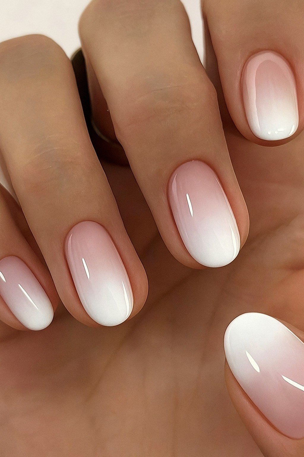 Pink and White Baby Boomer Nails for women over 50