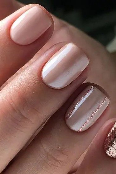 Nude Pink Nails with a Glitter Accent for women over 50