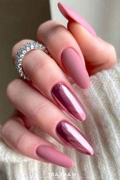 Mauve Chrome Stiletto Nails with a Diamond Ring for women over 50
