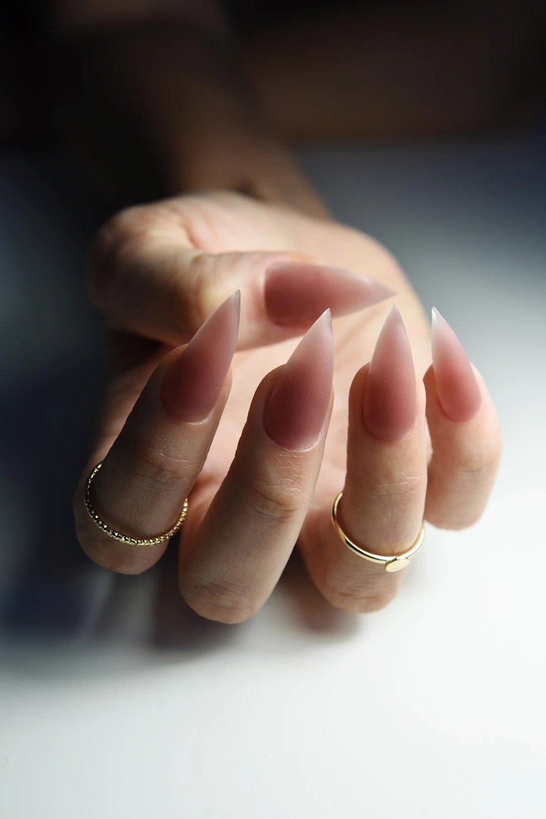 Glossy Nude Rose Almond Nails for women over 50