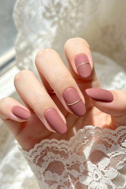 Dusty Rose Nails with a Thin Gold Line for women over 50
