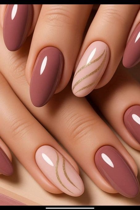Mauve Nails with Gold Swirl Lines for women over 50