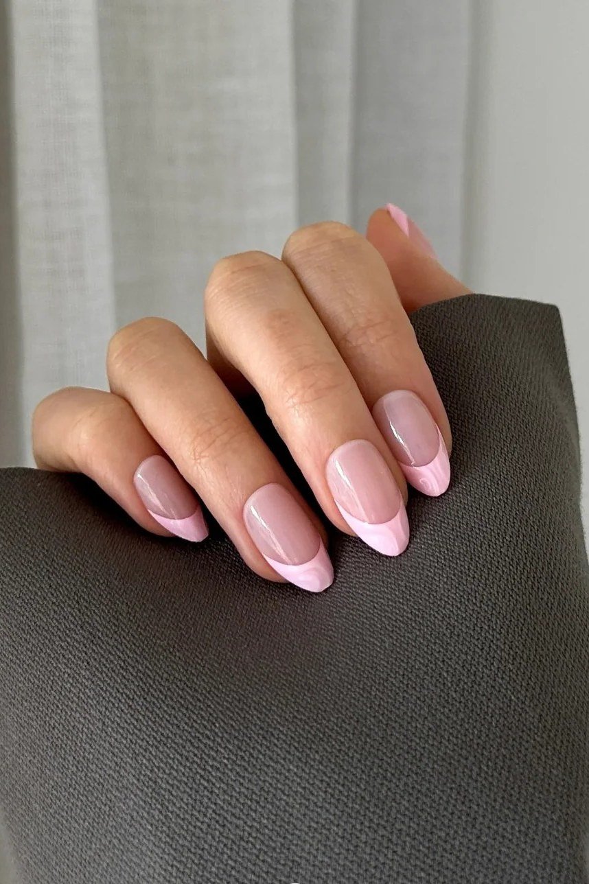 Short Pink French Tips on Dark Fabric for women over 50