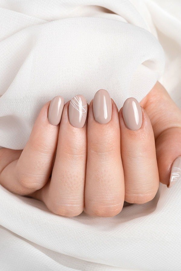 Short Nude Mauve Almond Nails - elegant almond nail idea for women over 60