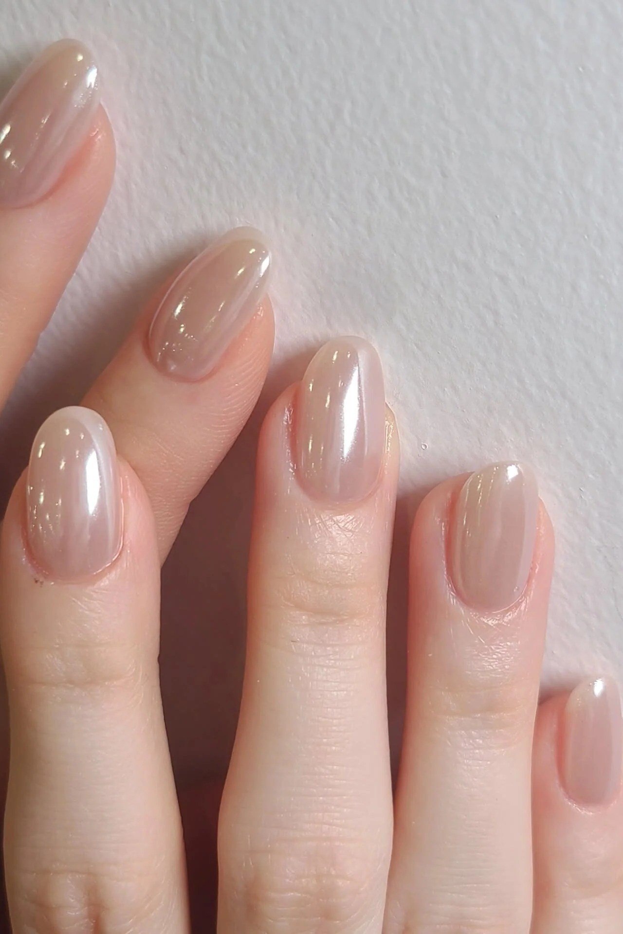 Sheer Nude Almond Nails - elegant almond nail idea for women over 60