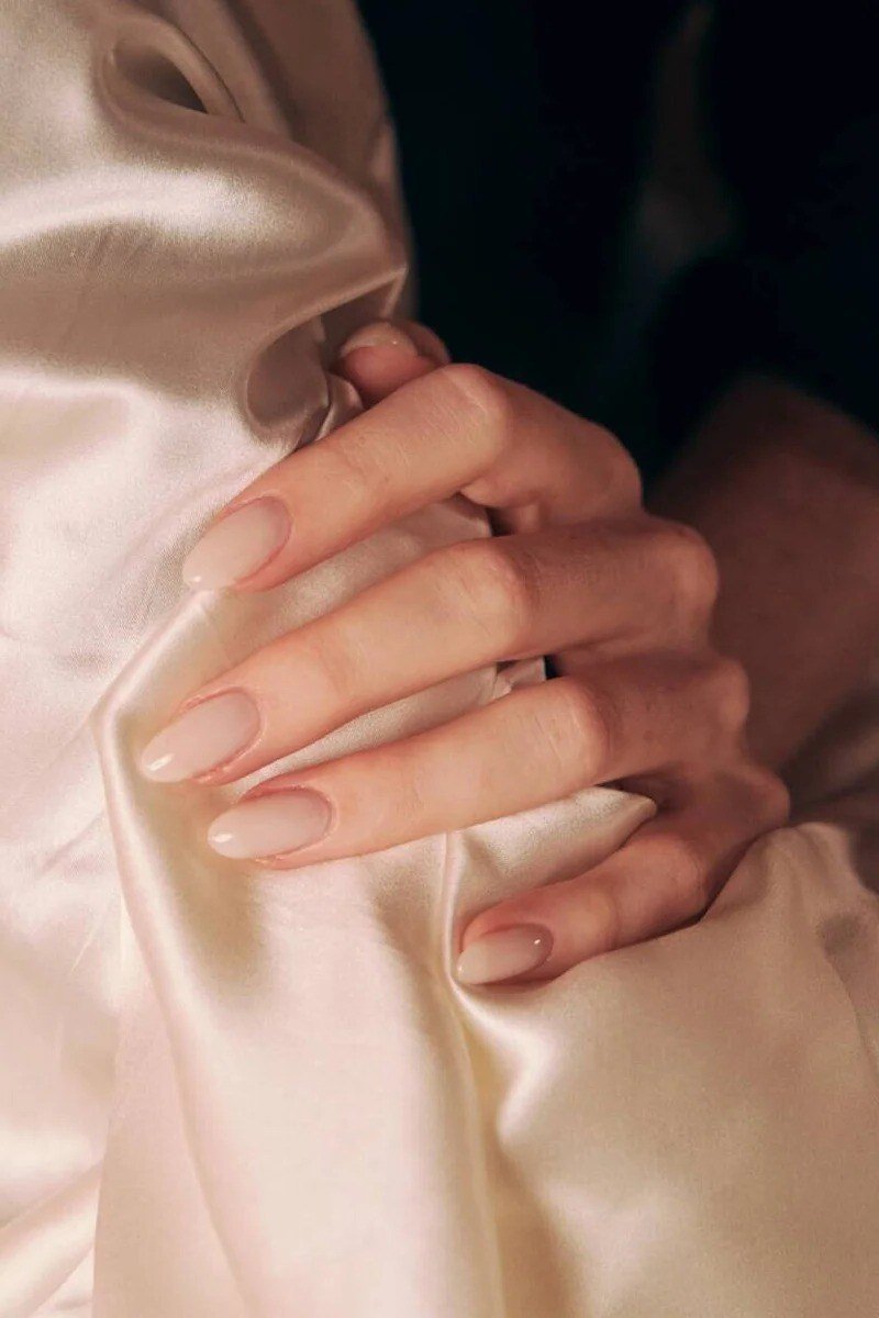 Nude Almond Nails with Satin Styling - elegant almond nail idea for women over 60