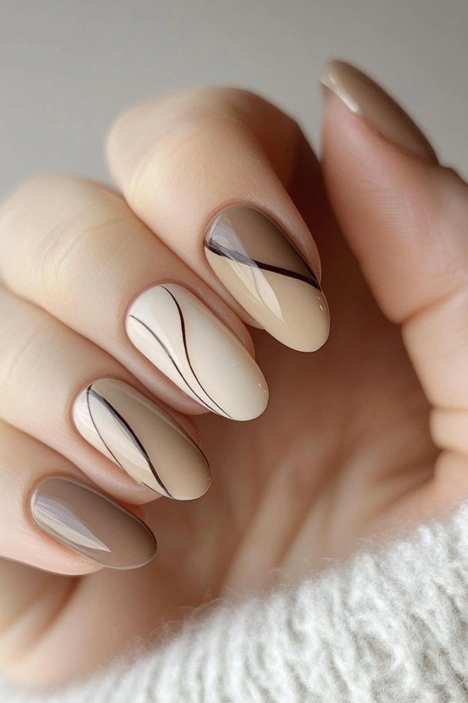 Almond White Nails with Brown Swirl Line Art - elegant almond nail idea for women over 60