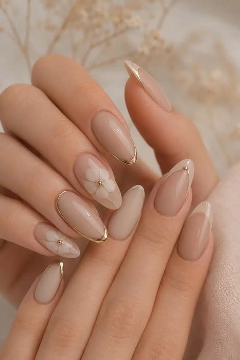 Almond Nude Nails with Marble and Gold Accents - elegant almond nail idea for women over 60