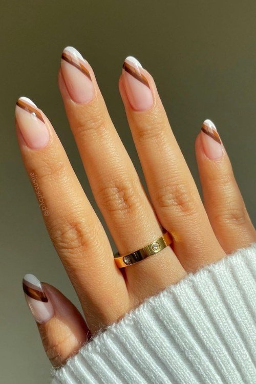 Almond Nails with Brown and White French Tips - elegant almond nail idea for women over 60