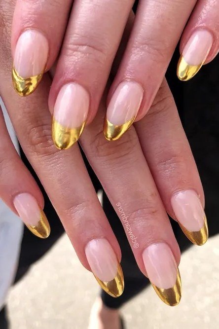 Pink Almond Nails with Gold French Tips - elegant almond nail idea for women over 60