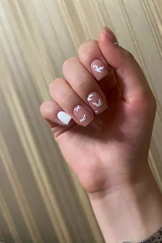 White and Pink French Almond Nails - elegant almond nail idea for women over 60