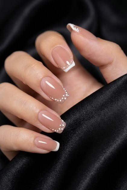 Nude Almond Nails with Rhinestone French Line - elegant almond nail idea for women over 60