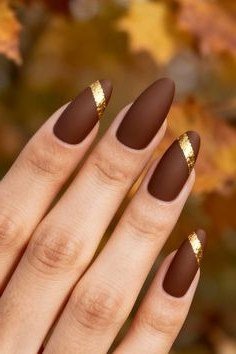Chocolate Matte Almond Nails with Gold Tips - elegant almond nail idea for women over 60