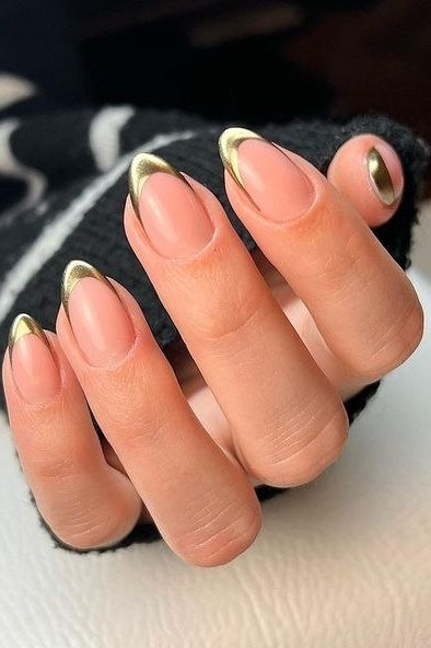 Nude Almond Nails with Gold French Tips - elegant almond nail idea for women over 60
