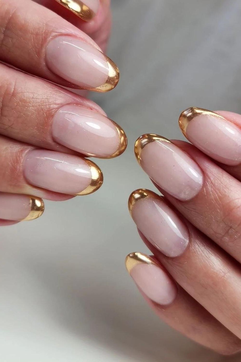 Pink Almond Nails with Gold Tips - elegant almond nail idea for women over 60