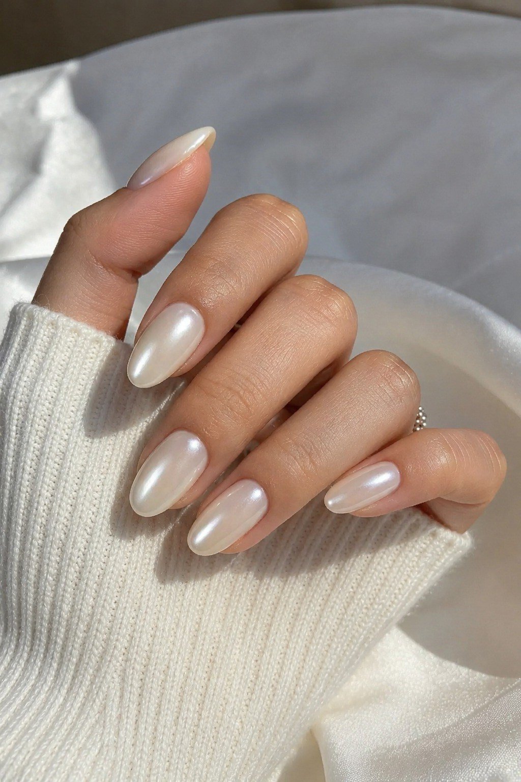 Pearl White Almond Nails - elegant almond nail idea for women over 60