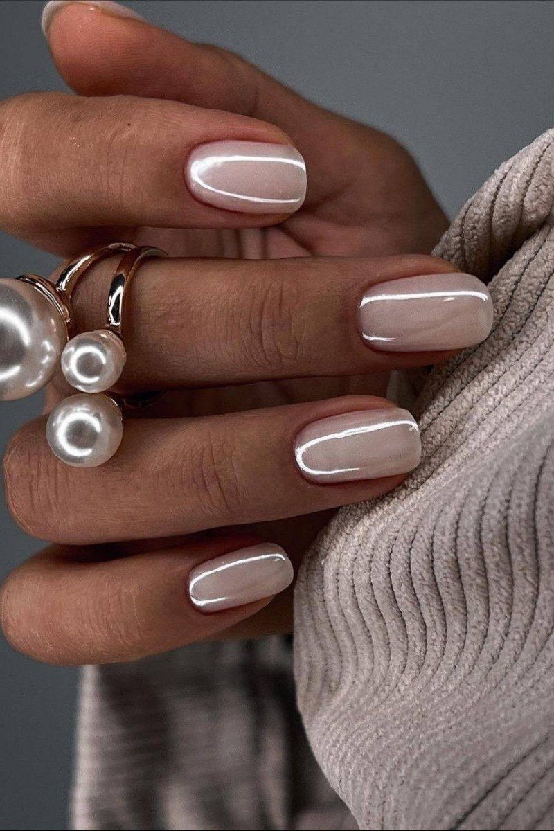 Pearl White Almond Nails with Pearl Rings - elegant almond nail idea for women over 60