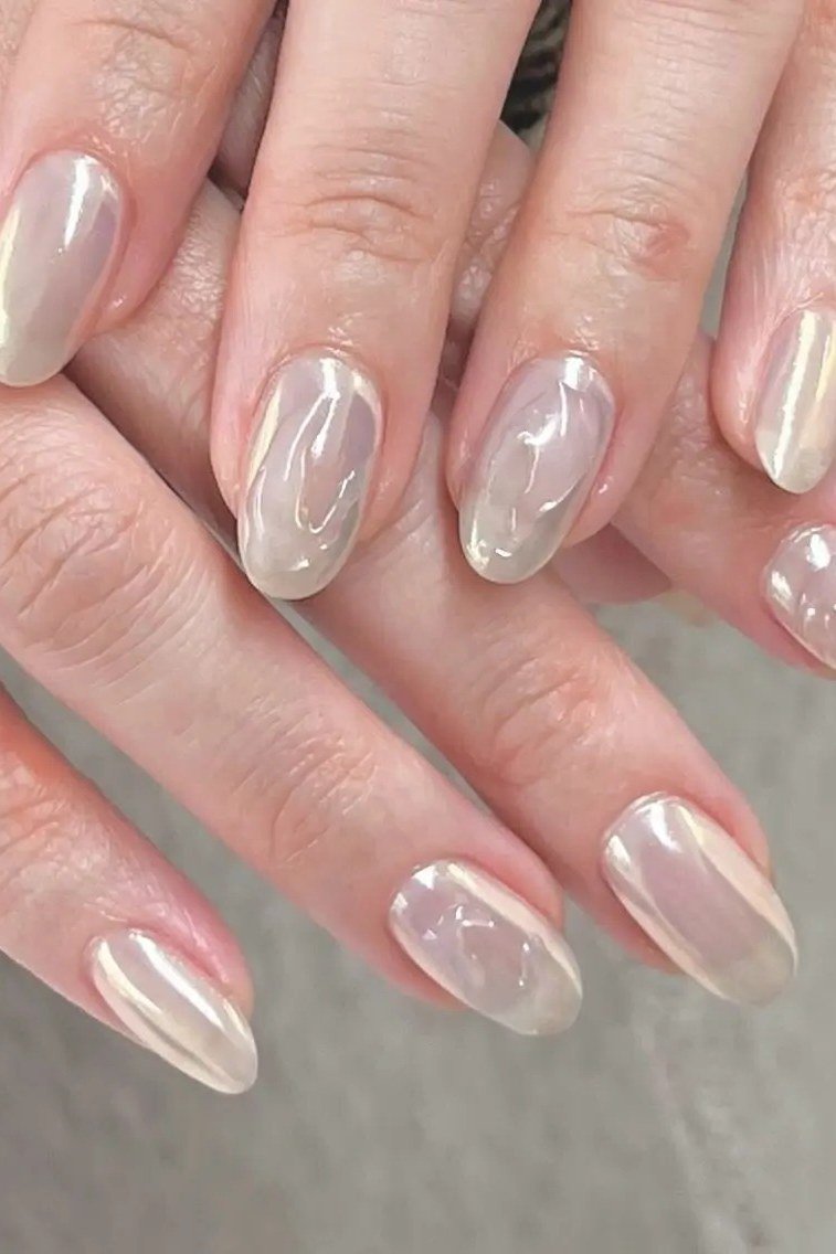 Pearl Marble Almond Nails - elegant almond nail idea for women over 60