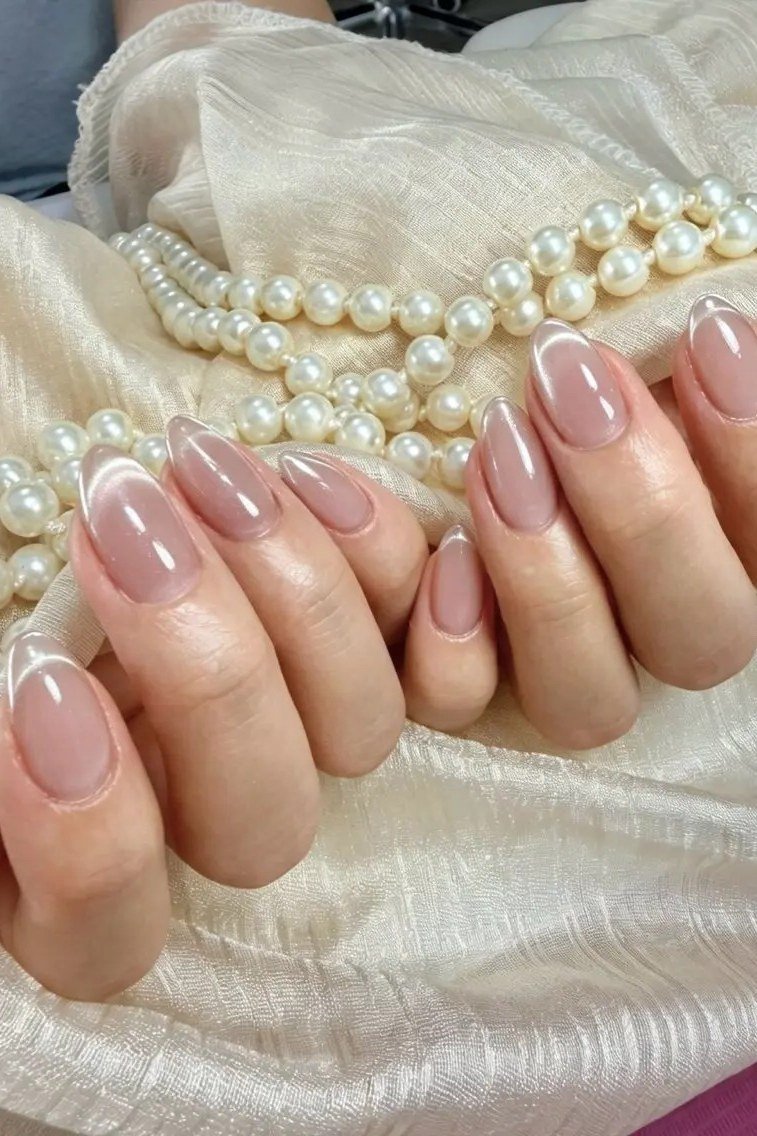 Pearl Nude Almond Nails with Pearl Styling - elegant almond nail idea for women over 60
