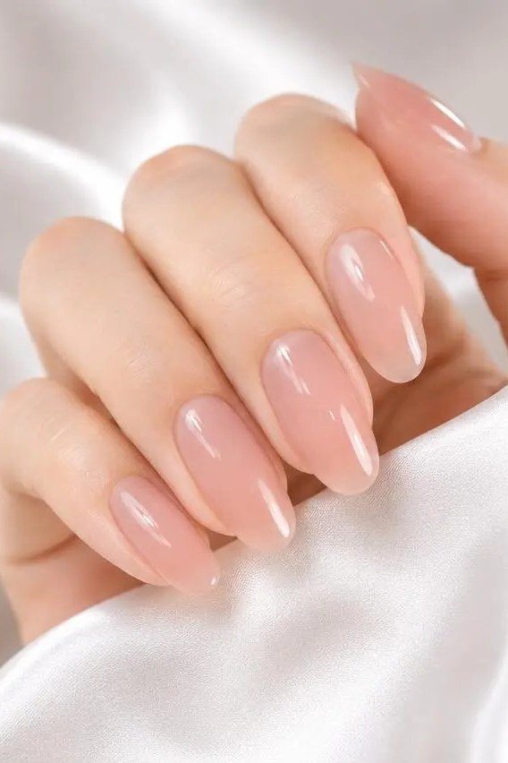 Pink Nude Almond Nails - elegant almond nail idea for women over 60