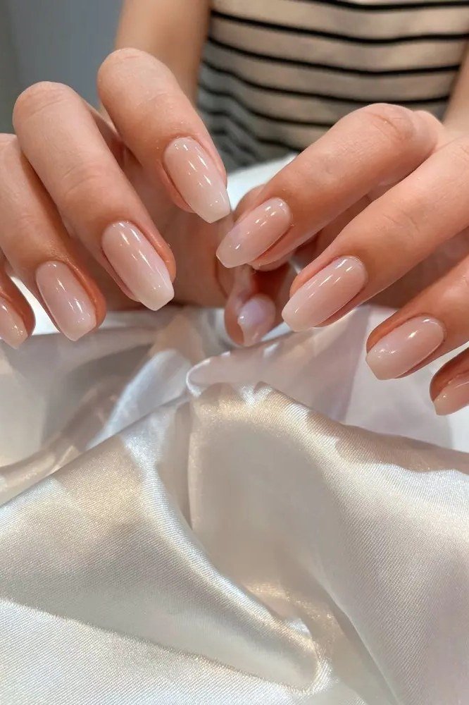 Pink Nude Almond Nails - elegant almond nail idea for women over 60