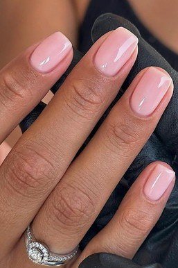 Pink Almond Glossy Nails - elegant almond nail idea for women over 60