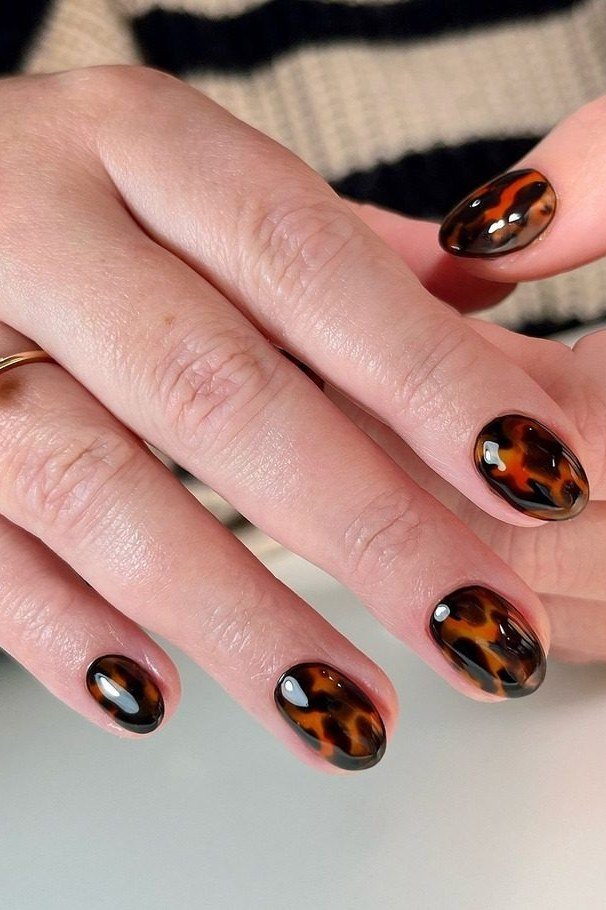 Tortoiseshell Short Almond Nails - elegant almond nail idea for women over 60