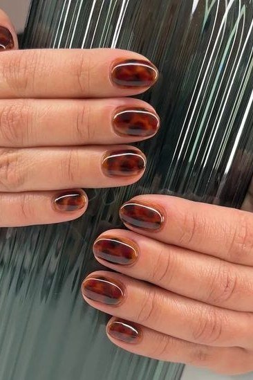 Burgundy Glossy Almond Nails - elegant almond nail idea for women over 60