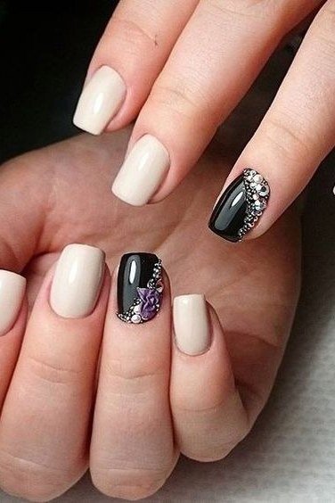 Ivory Almond Nails with Black and Silver Accent Nails - elegant almond nail idea for women over 60